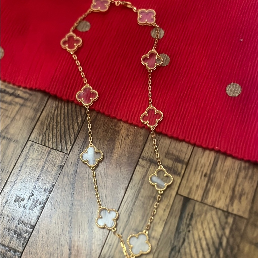 Gold and Clear Clover Necklace with Elegant Design
